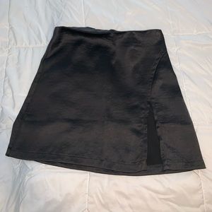 Black silk mini skit with slit
